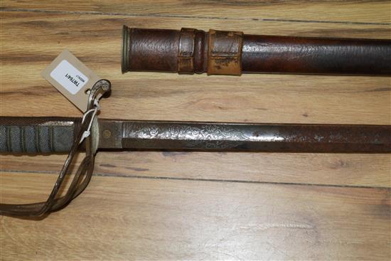 An 1821 pattern WWI George V Royal Artillery officers sword with leather-covered scabbard